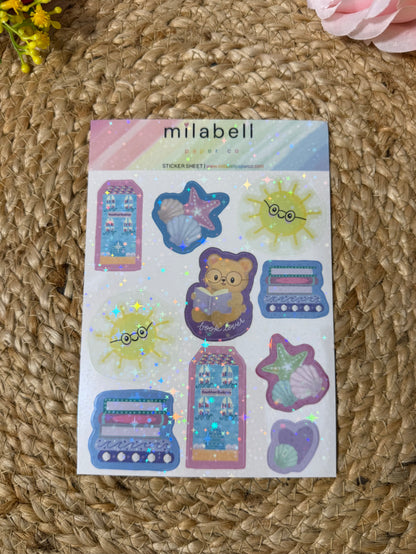 Beach Books Sticker Sheet in Vinyl Star Holographic finish featuring original Milabell Paper Co. artwork.