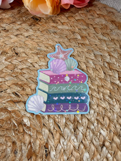 Beach Books Vinyl Sticker in Vinyl Star Holographic finish featuring original Milabell Paper Co. artwork.