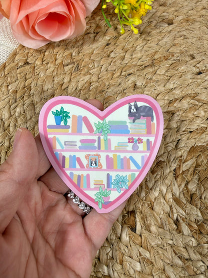 Close-up of the Kitty's Library Vinyl Sticker in Vinyl Glossy finish held in hand.