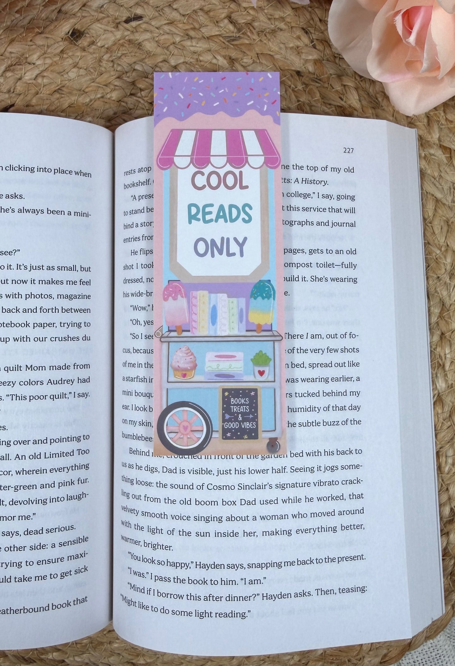 Popsicle Cart Bookmark marking a page inside a book.
