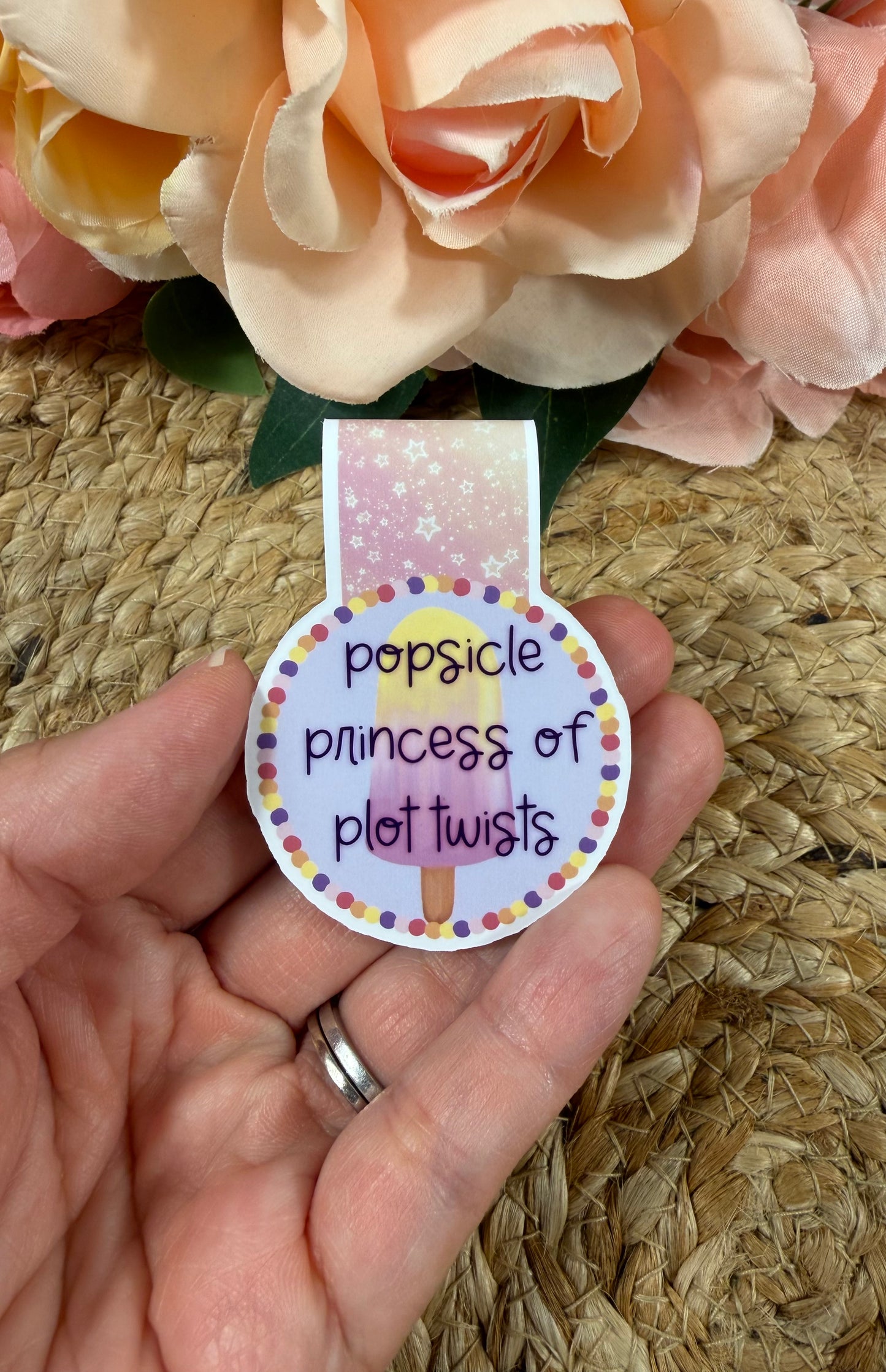 Popsicle Princess magnetic bookmark held in hand to show its size and design.