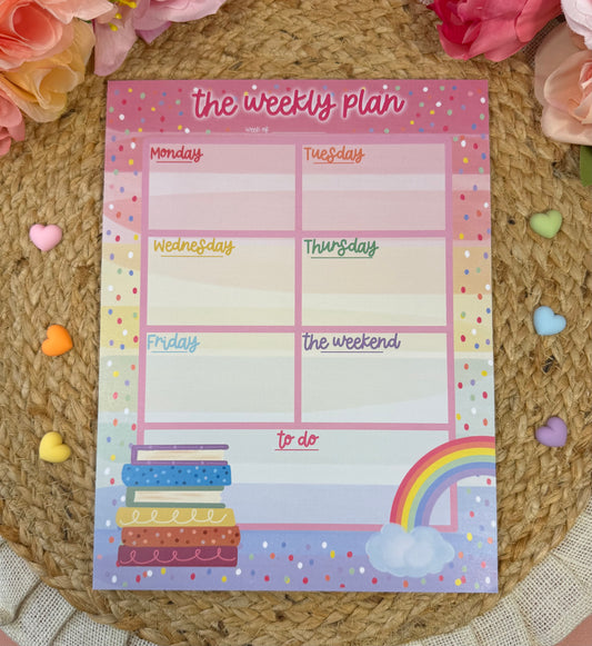 Rainbow Books Weekly Planner featuring original Milabell Paper Co. artwork.