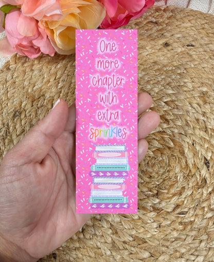 Sprinkles Bookmark held in hand.